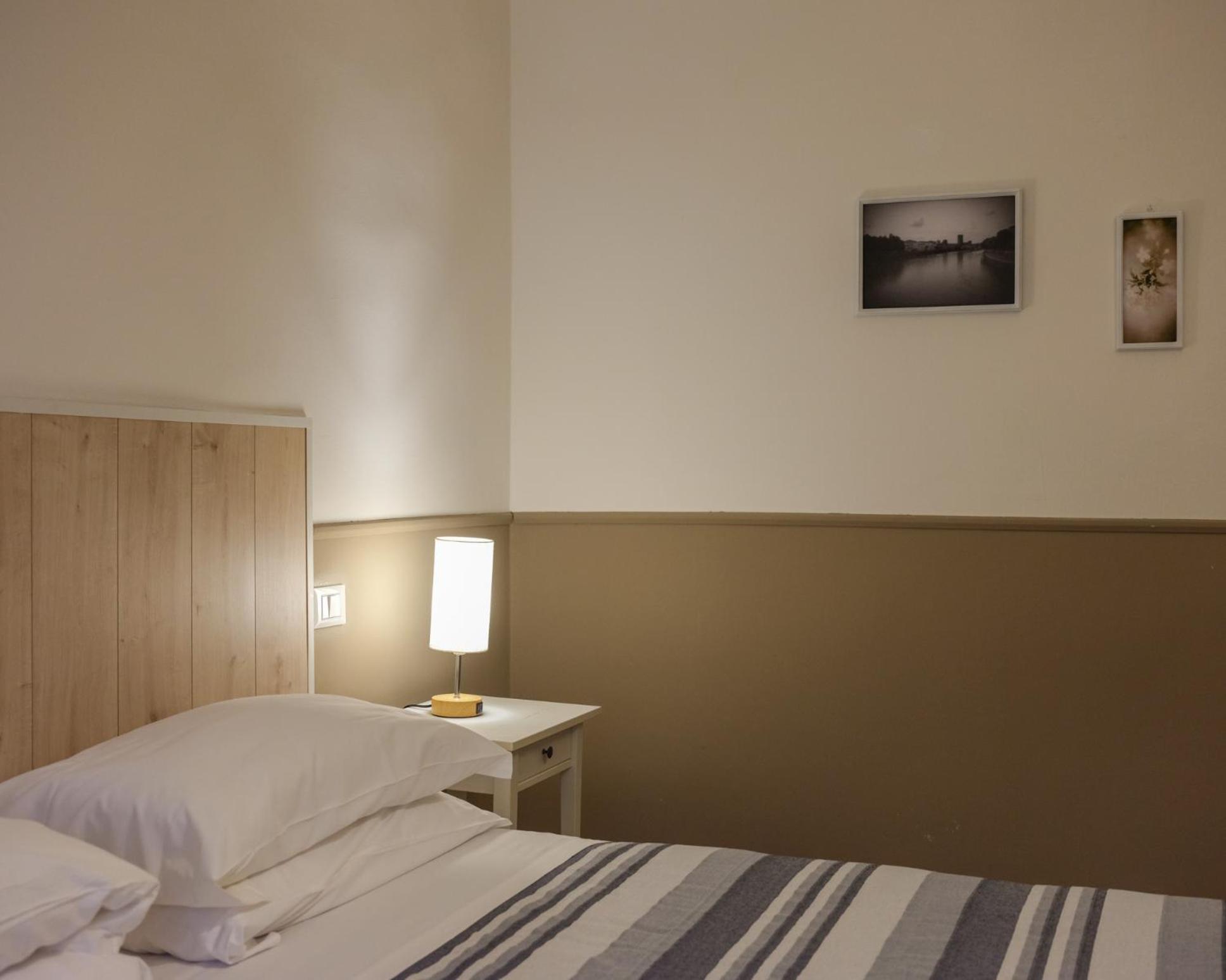 Camera Familiare con Bagno in Comune